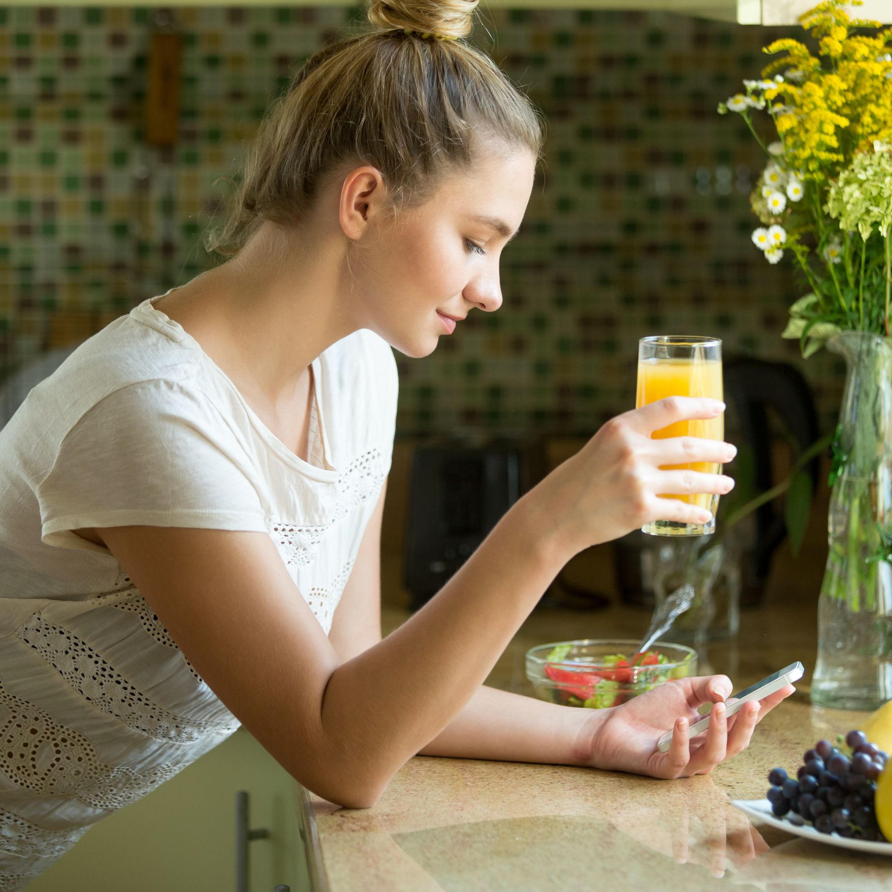 beautiful girl with glass of juice essential vitamins and minerals for women